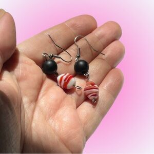Vintage art glass dangle earrings red swirl w/ black